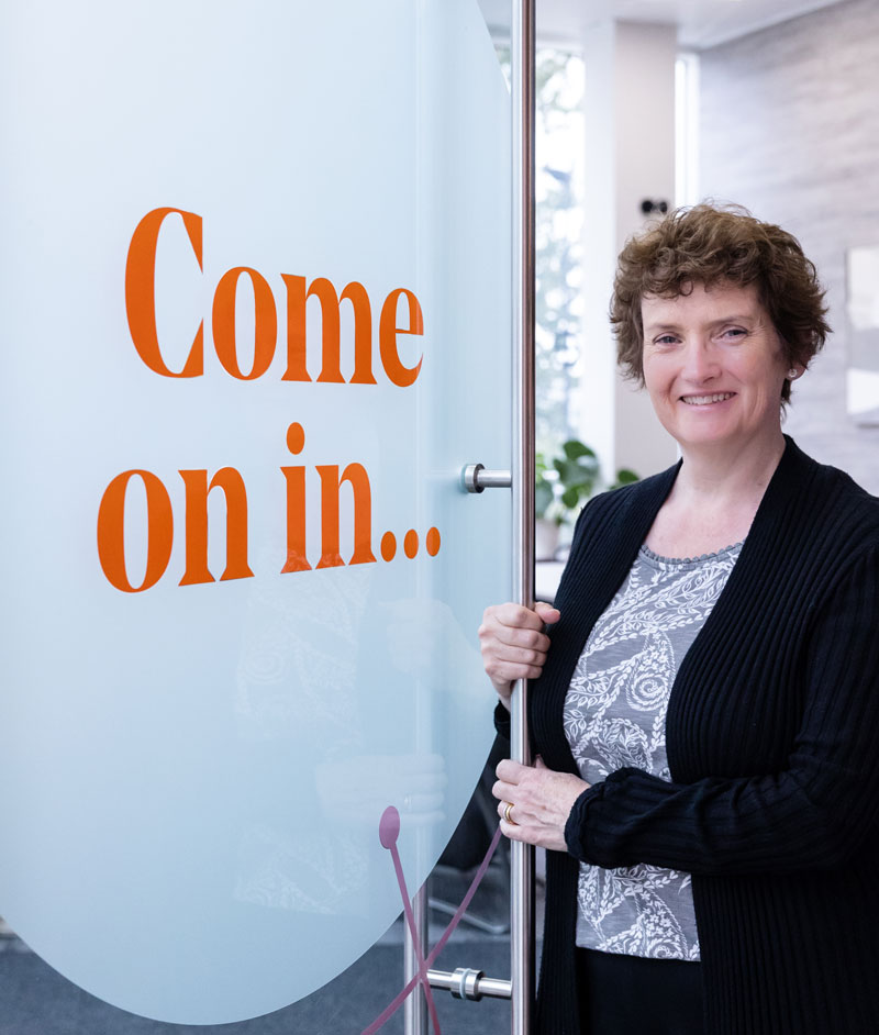 Flexible Workspace, Alison Harmer entering a glass door