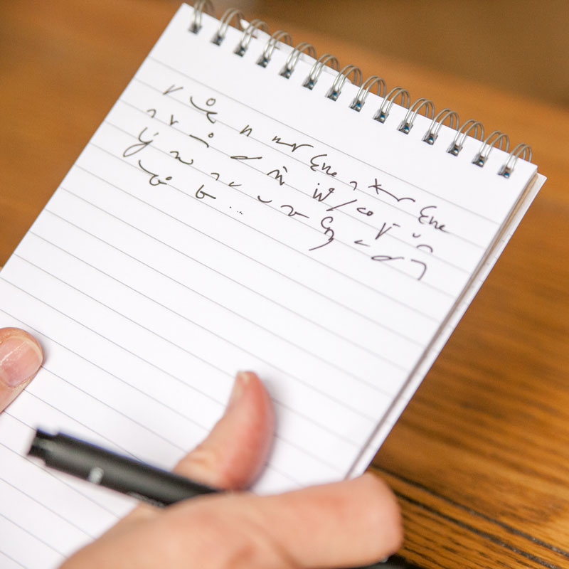 A reporter's notebook with shorthand