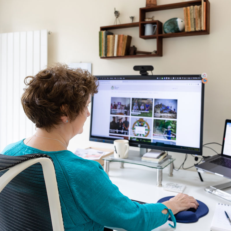 Internal communications, Alison Harmer sat at a desk